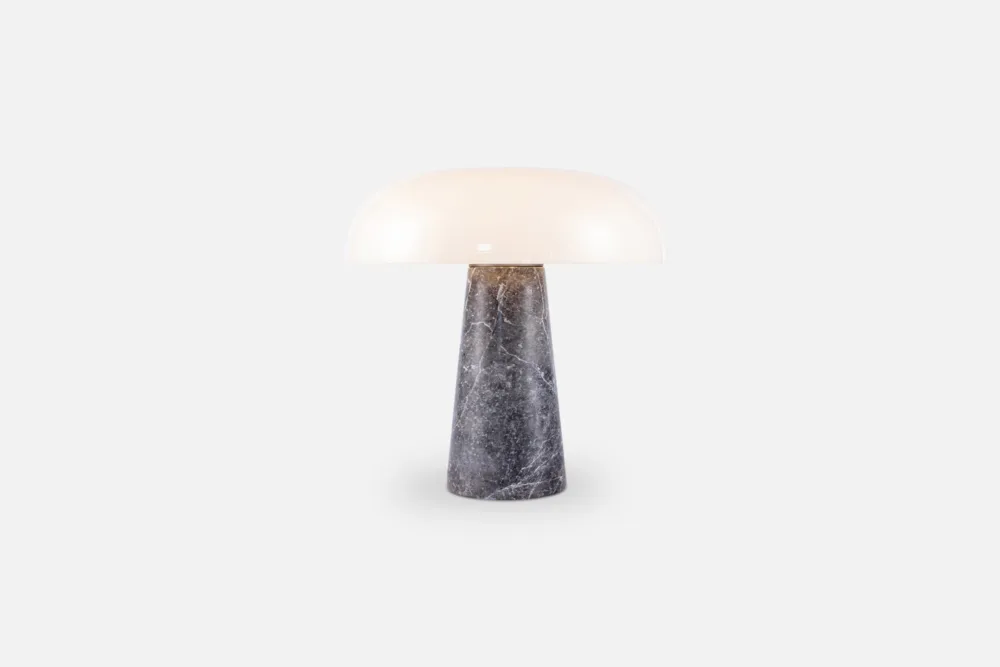 Modern marble and alabaster table lamp with a minimalist design, perfect for adding a touch of elegance to living spaces.