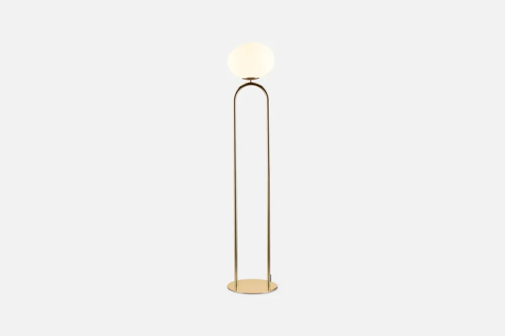 Glass and Brass Floor Lamp: Modern brass floor lamp with a white opal glass shade, minimalist and elegant design for contemporary living spaces.