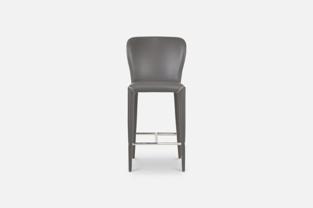 PU Barstool: Sleek PU barstool, providing a stylish and affordable seating solution for your dining area. Discover our PU leather seating options at Bradfords, Auckland, New Zealand. Upholstered with cross stitch detail.