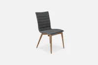 Sleek grey fabric dining chair with walnut wood legs, offering versatility and modern style for your home. Find it at Bradfords, Auckland, New Zealand.