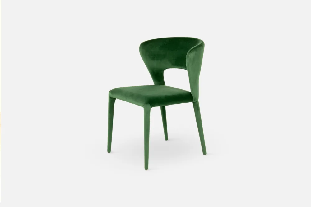 Opulent green velvet dining chair, adding a touch of glamour and sophistication to your dining room decor. Shop our plush velvet seating collection at Bradfords, Auckland, New Zealand.