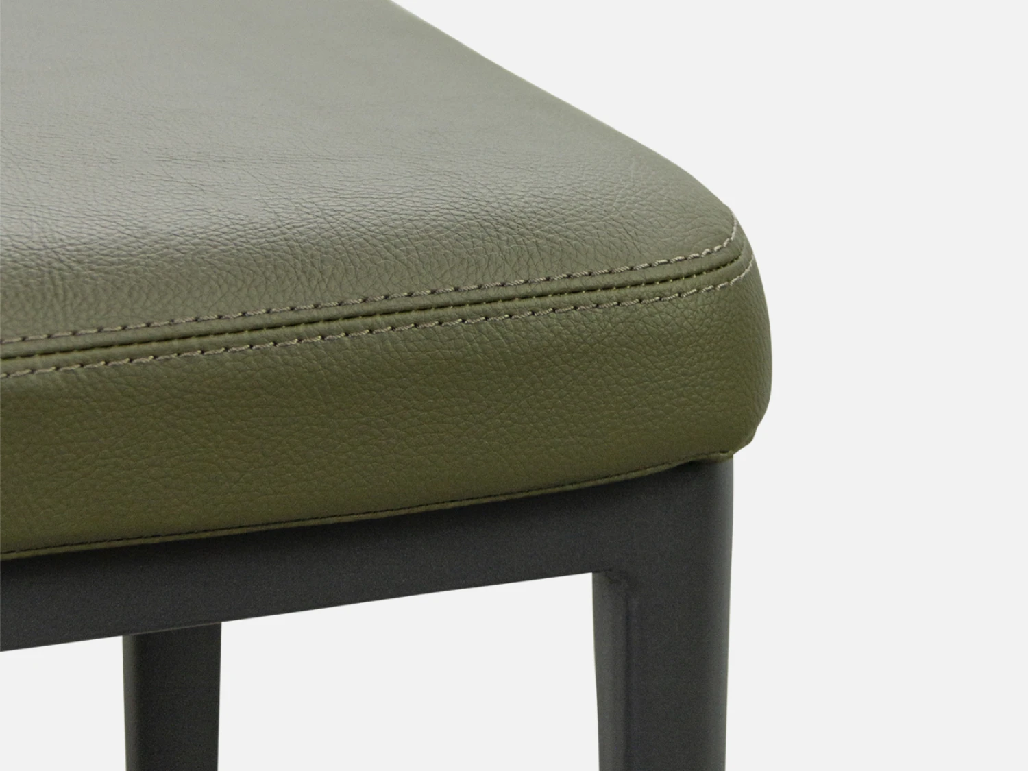 Fresh forrest green PU Leather dining chair, blending seamlessly with natural or modern decor. Shop now at Bradfords, Auckland, New Zealand.