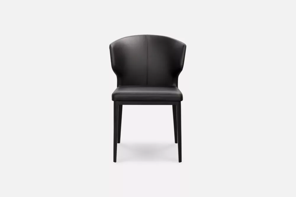 Sophisticated black PU leather dining chair, adding a sleek and contemporary touch to your dining space. Purchase now at Bradfords, Auckland, New Zealand.