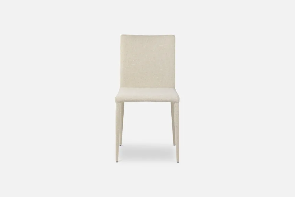 Chic beige dining chair, exudes understated elegance and versatility. Find your perfect neutral seating option at Bradfords, Auckland, New Zealand.