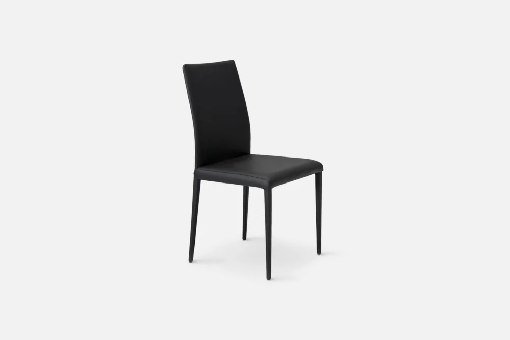 Sophisticated black leather dining chair, adding a sleek and contemporary touch to your dining space. Purchase now at Bradfords, Auckland, New Zealand.