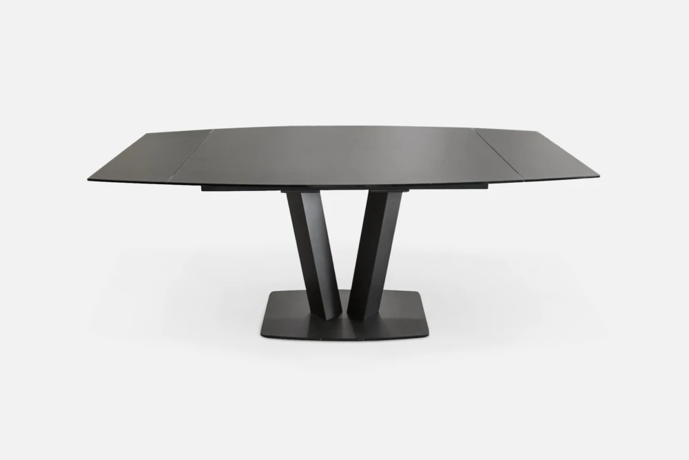 Black Metal Extension Dining Table: Contemporary black metal dining table, offering durability and style for your dining space. Discover our black metal table options at Bradfords, Auckland, New Zealand.