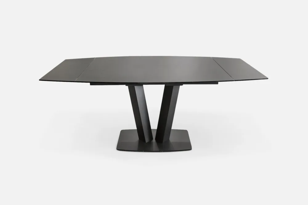 Black Metal Extension Dining Table: Contemporary black metal dining table, offering durability and style for your dining space. Discover our black metal table options at Bradfords, Auckland, New Zealand.