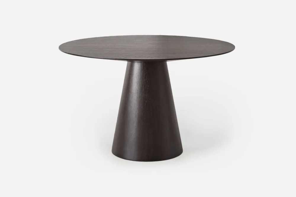 Grey Wash Oak Round Dining Table: Sleek black oak dining table, combining modern elegance with natural charm. Explore our range of black oak tables at Bradfords, Auckland, New Zealand.