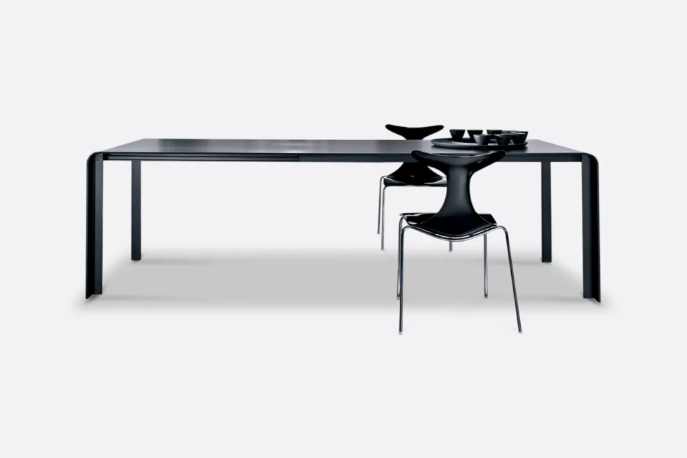 Black Metal Dining Table: Alucompact Contemporary black metal dining table, offering durability and style for your dining space. Italian designed and made. Discover our black metal table options at Bradfords, Auckland, New Zealand.